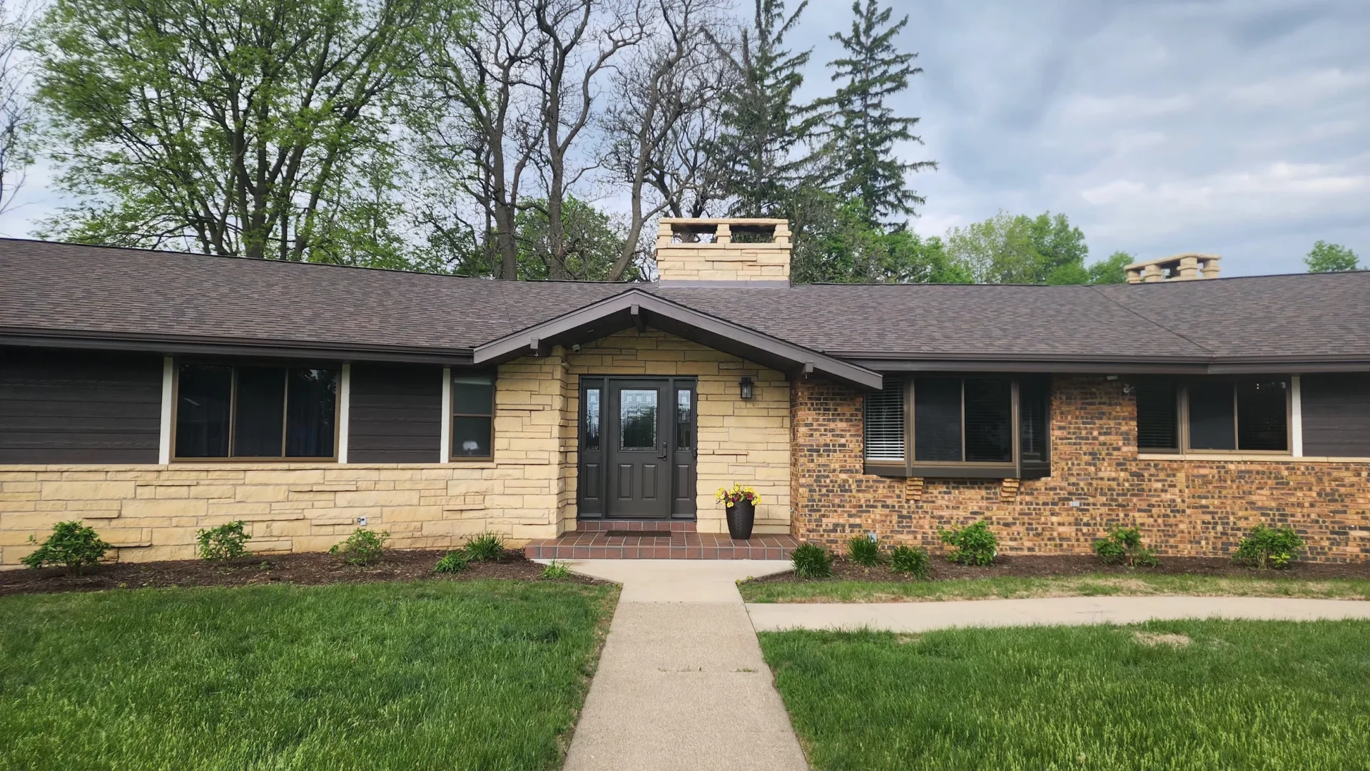 Roof replacement front of house shot on 6-26-25 in Dubuque, IA