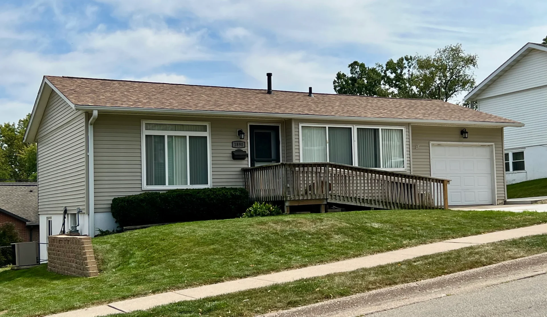 shingle roof replacement front of home in Dubuque, IA on 9-9-25