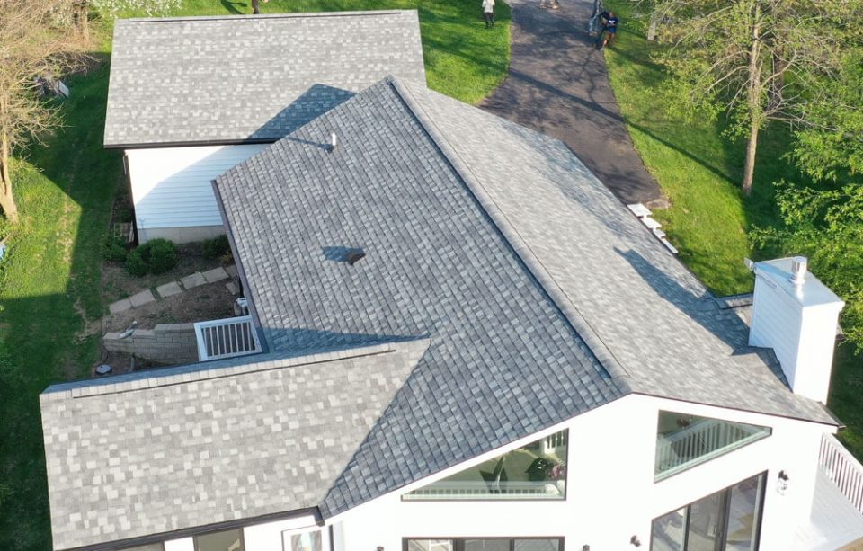 Aerial view of a home after the full roof replacement has been completed