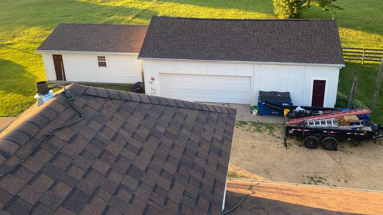 Freeport, IL home and garage with new asphalt roofs