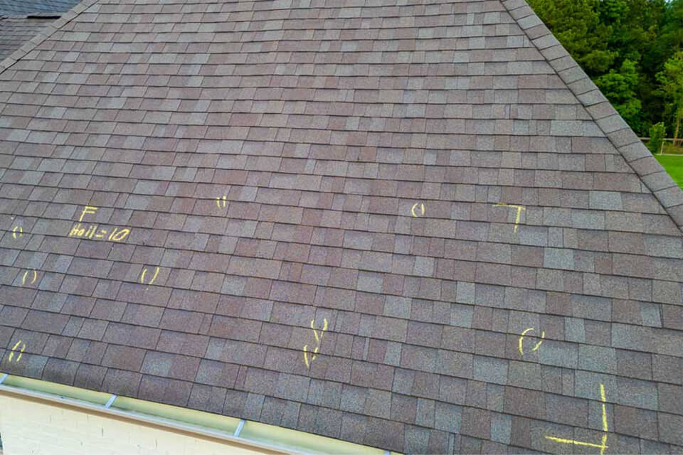 Photo of a roof showing chalk marks after a roof inspection
