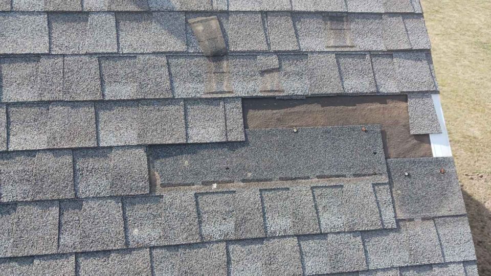 Warren, IL house #1 before roof replacement, closeup of missing shingles